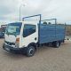 Nissan Cabstar NT 400 caja abierta con plataforma elevadora